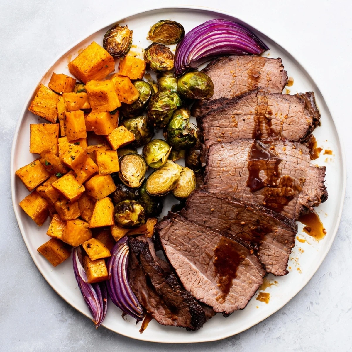 Golden, tender Seasonal Glow Keto Roast, surrounded by vibrant roasted vegetables, ready for a low-carb dinner.