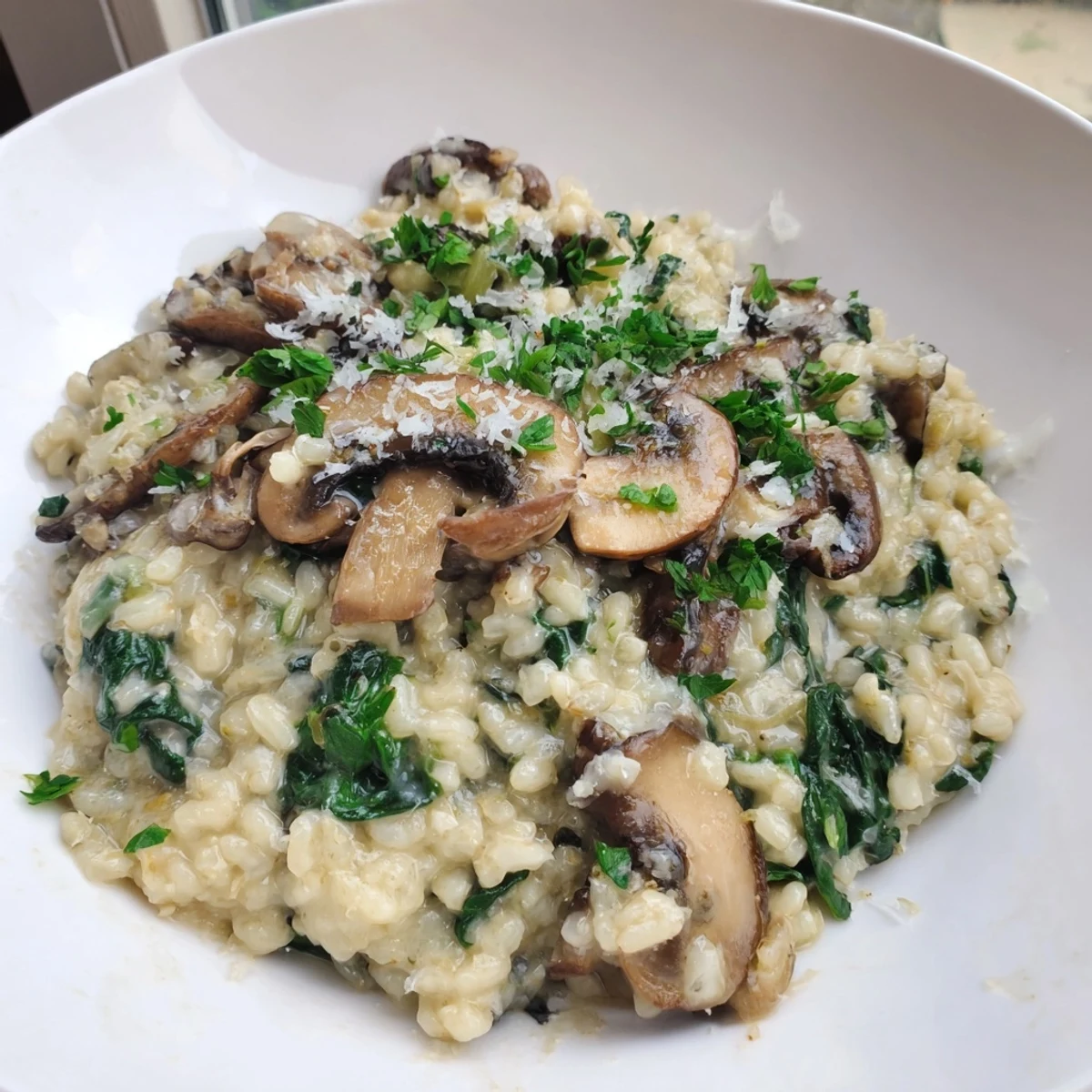 A close-up of a warm bowl of Cozy Evening Keto Risotto, ready for a delicious, low-carb dinner.