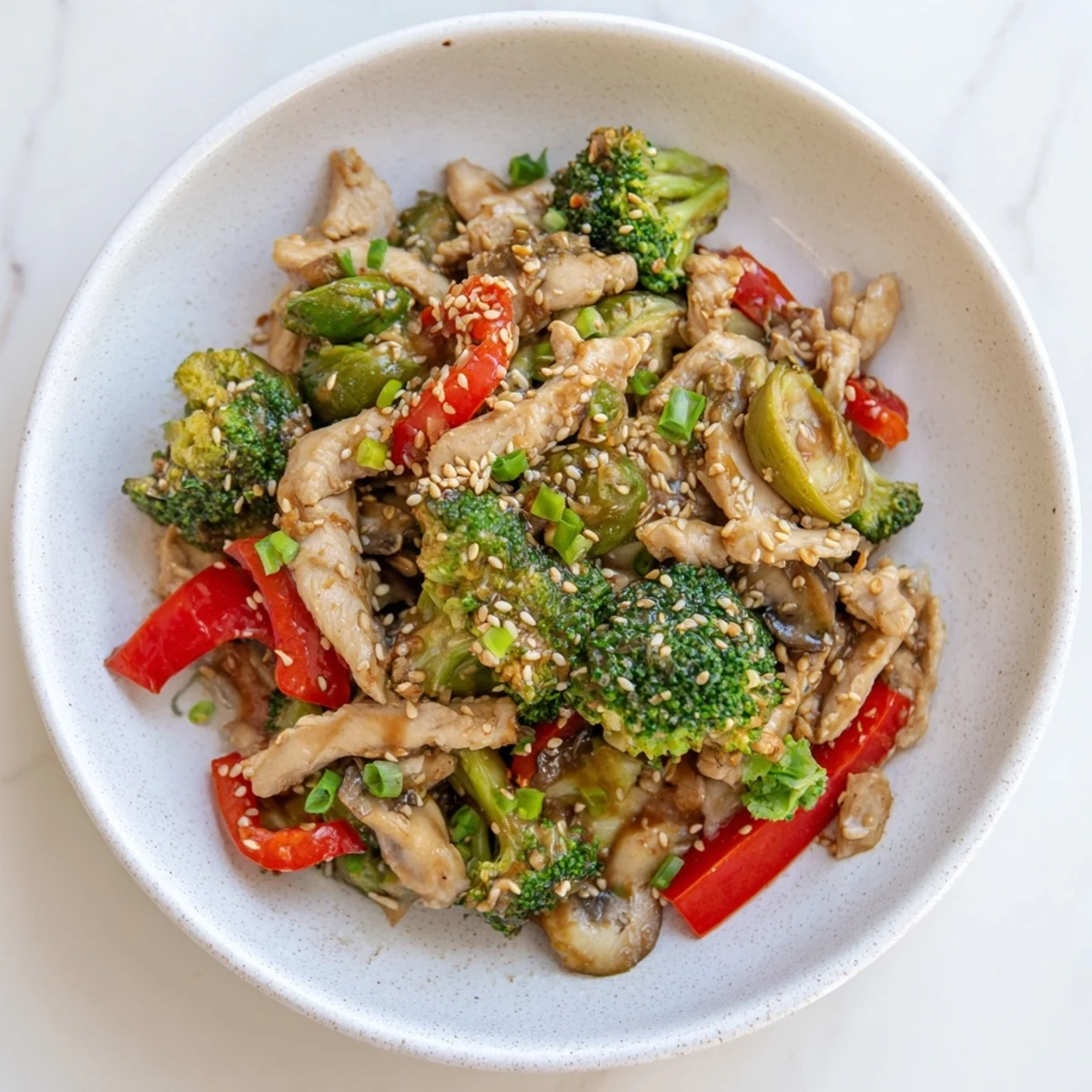 Vibrant Winter Harvest Low Carb Stir Fry with colorful vegetables and tender chicken, ready to enjoy.