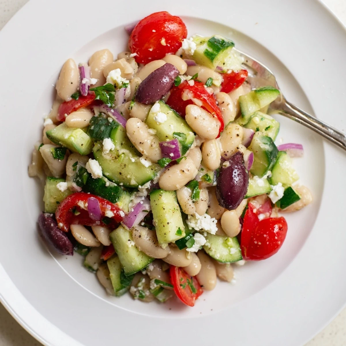 Mediterranean White Bean and Cucumber Tomato Salad with bright lemon dressing, refreshing