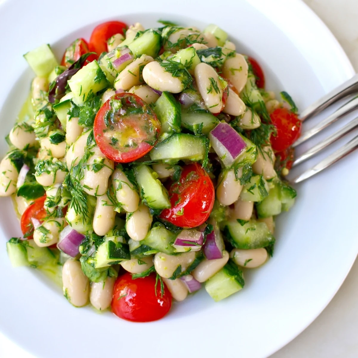 Mediterranean White Bean and Cucumber Dill Salad with bright lemon dressing, chopped herbs