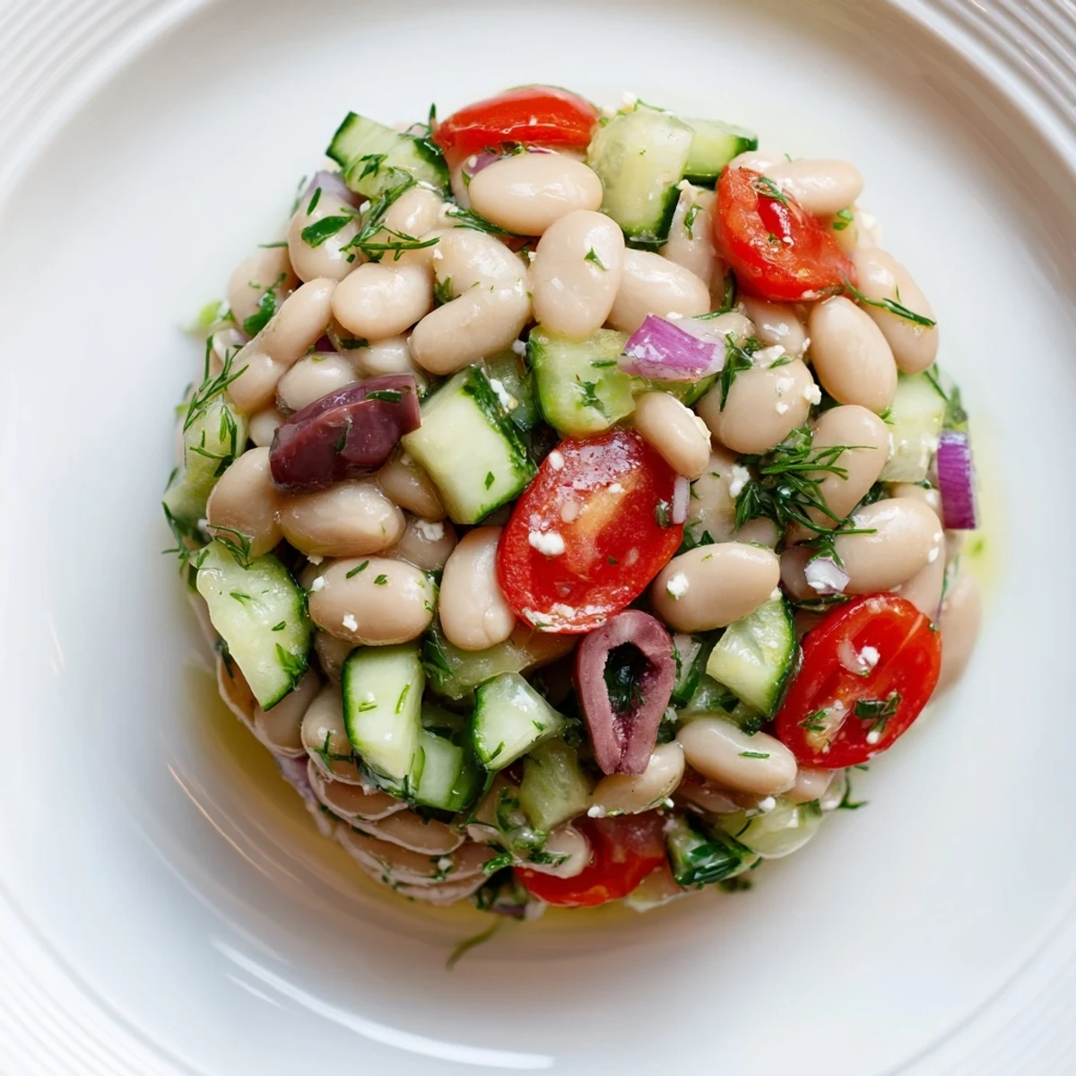 Chilled Mediterranean White Bean and Cucumber Dill Salad served with pita, herb aroma