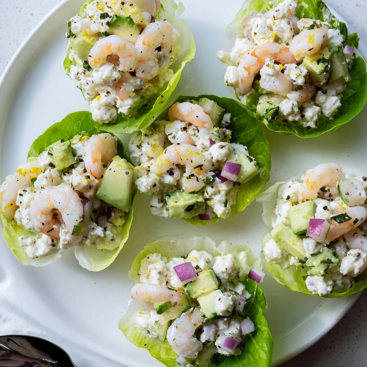 Cottage Cheese Lemon Basil Shrimp Salad Cups arranged on platter, bright lemony aroma