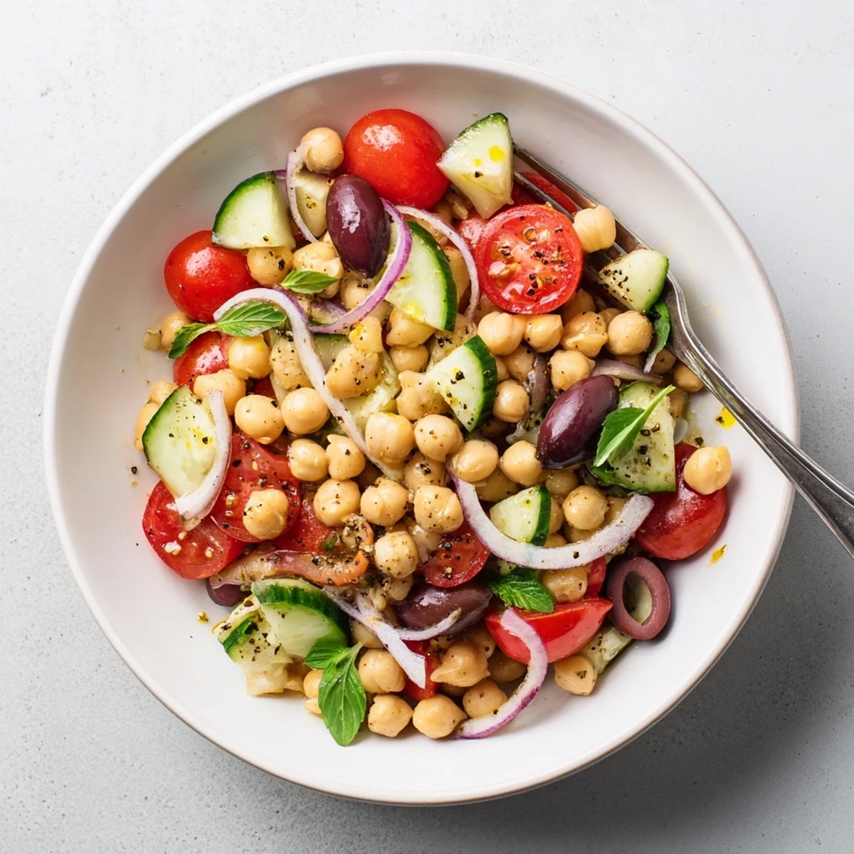 Mediterranean Chickpea and Tomato Basil Cucumber Salad, juicy tomatoes and crisp cucumbers