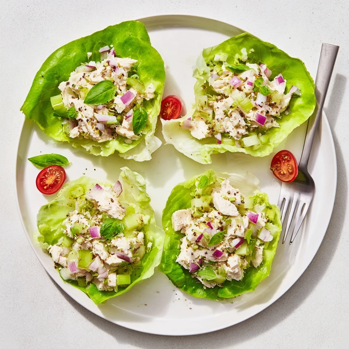 Cottage Cheese Basil Lemon Chicken Salad Cups nestled in crisp butter lettuce