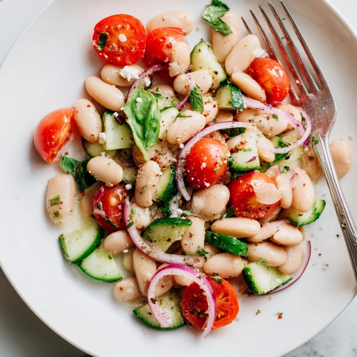Mediterranean White Bean and Tomato Basil Cucumber Salad with creamy beans and crisp cucumbers