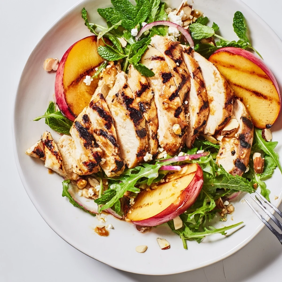 Grilled Nectarine and Arugula Chicken Salad with Mint, peppery arugula and charred fruit.