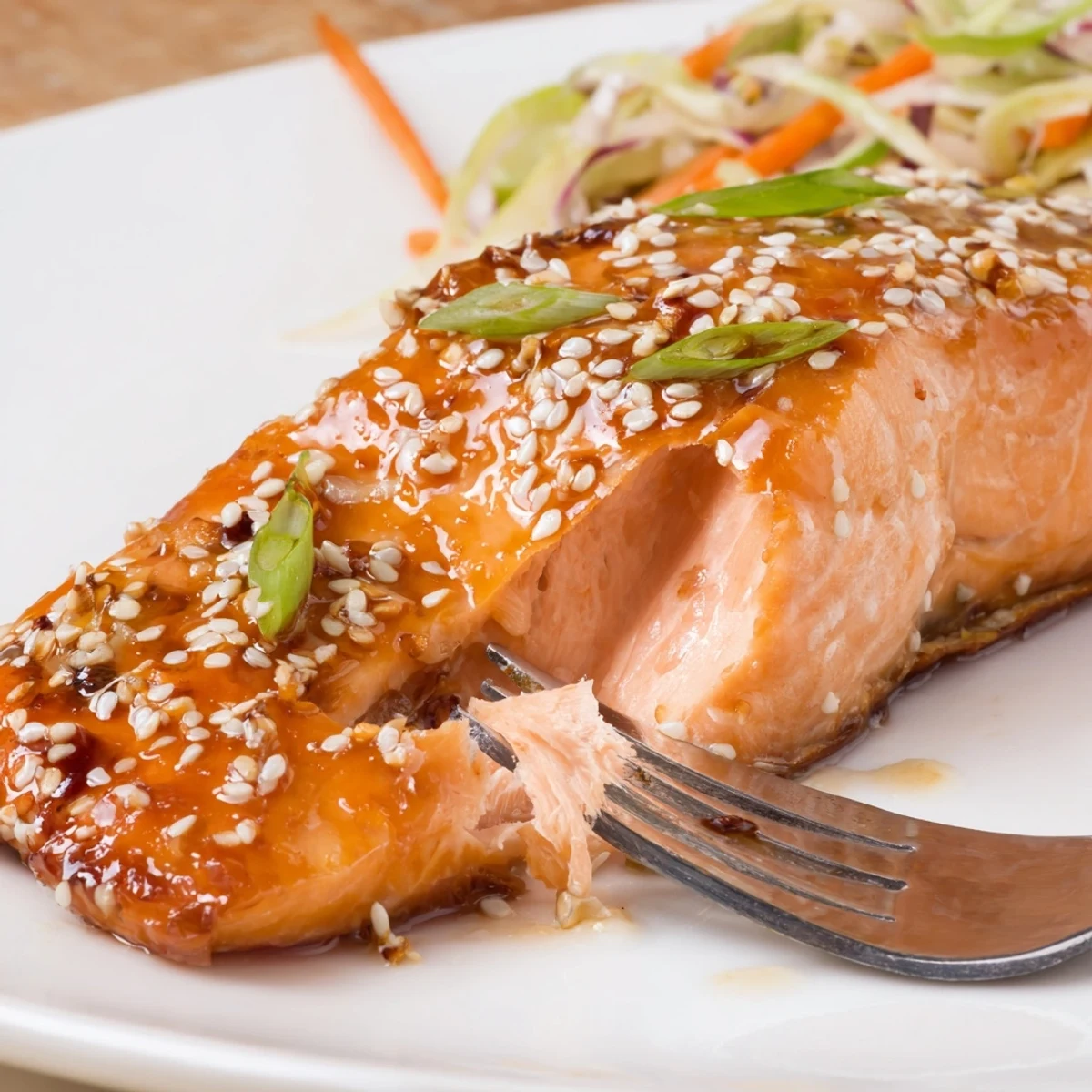 Fork-tender, honey-miso fillet, Miso Ginger Salmon With Sesame Snap Pea Slaw.